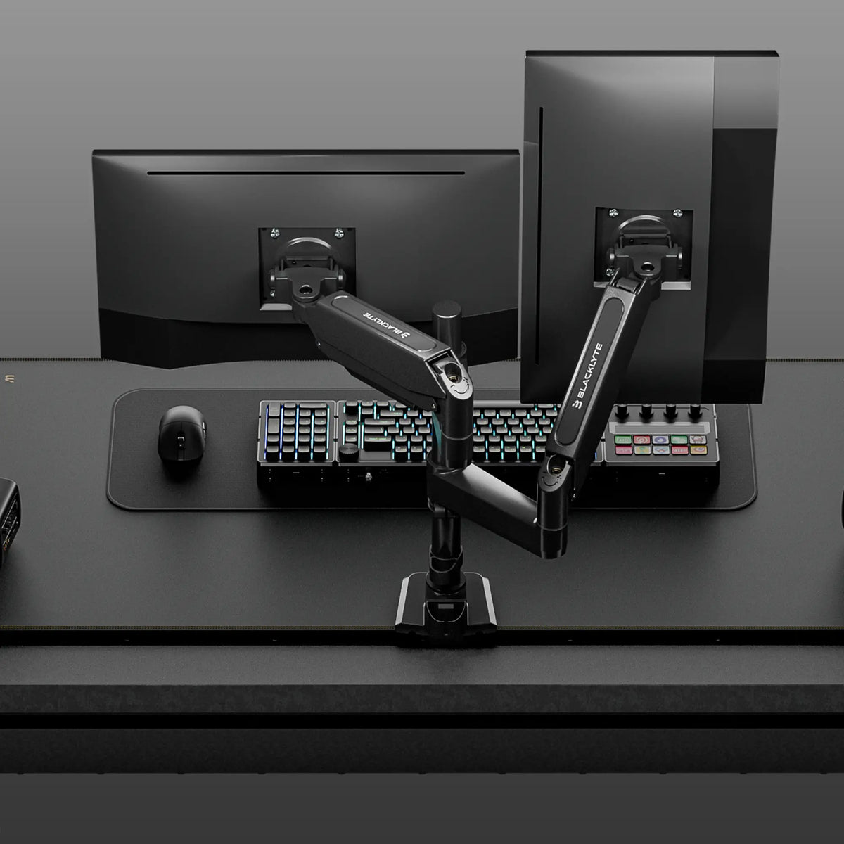 Blacklyte Atlas dual monitor arm holding two screens
