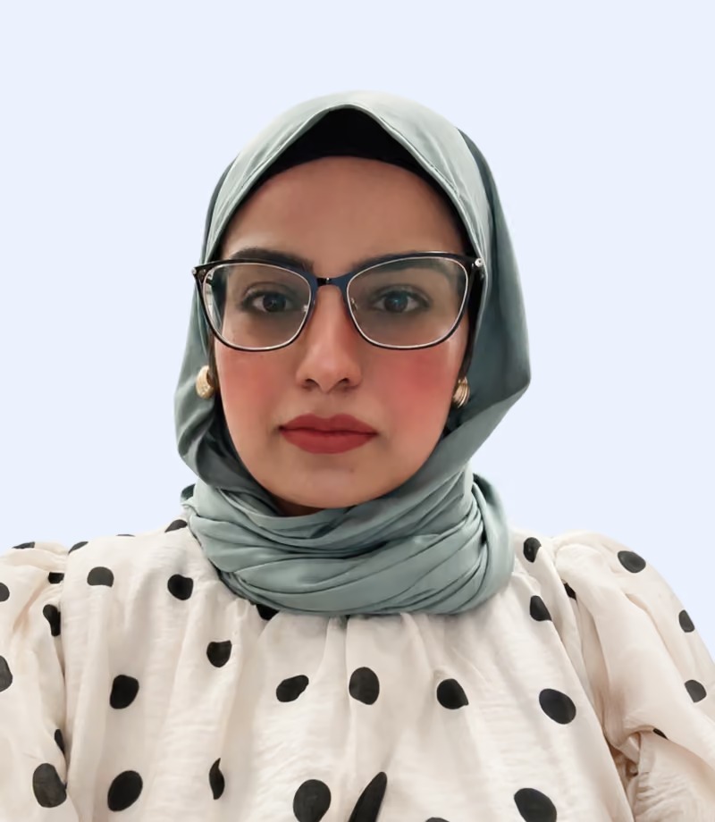Member of the Bolt Pharmacy team wearing glasses and a headscarf