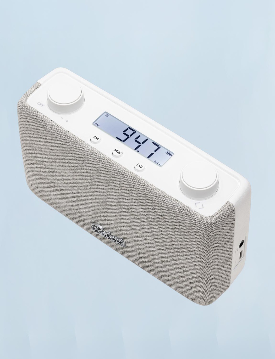 White Roberts portable FM radio with an LCD display