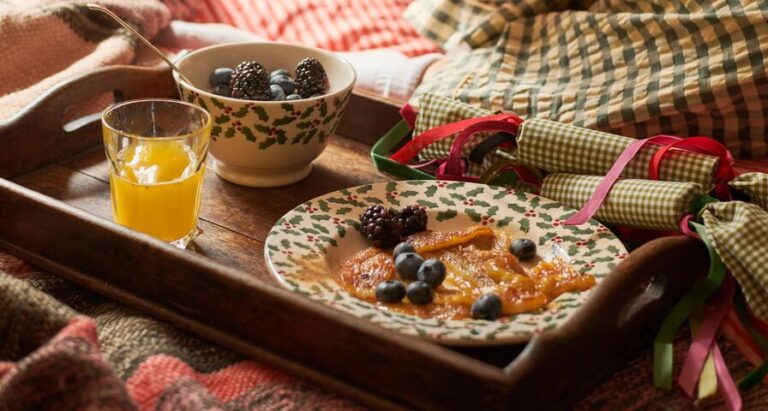 Emma Bridgewater Christmas 2026: Festive Pottery and Gift Ideas Emma Bridgewater Tiny Scattered Holly pottery on a festive breakfast tray