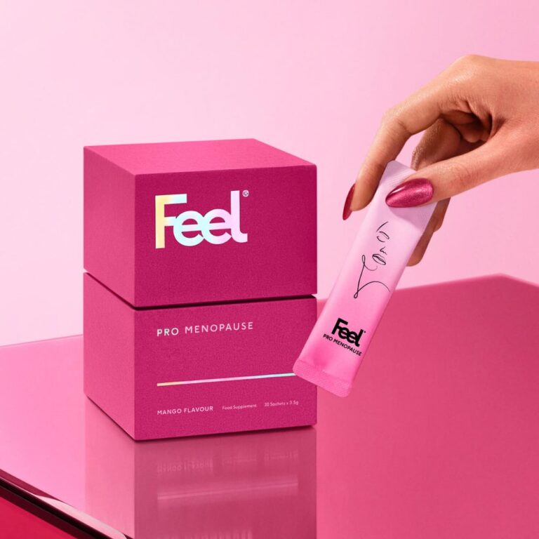 Feel Pro Menopause box with a sachet held in a hand
