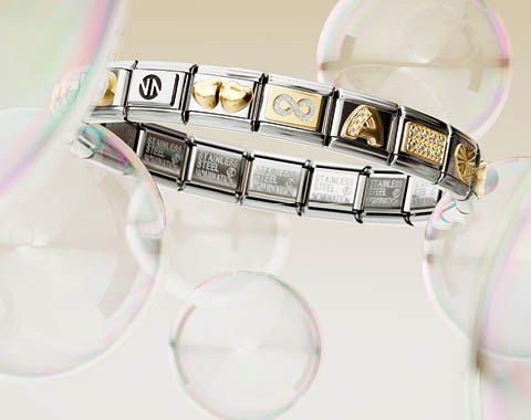 Stack of Nomination Composable bracelets in silver and gold