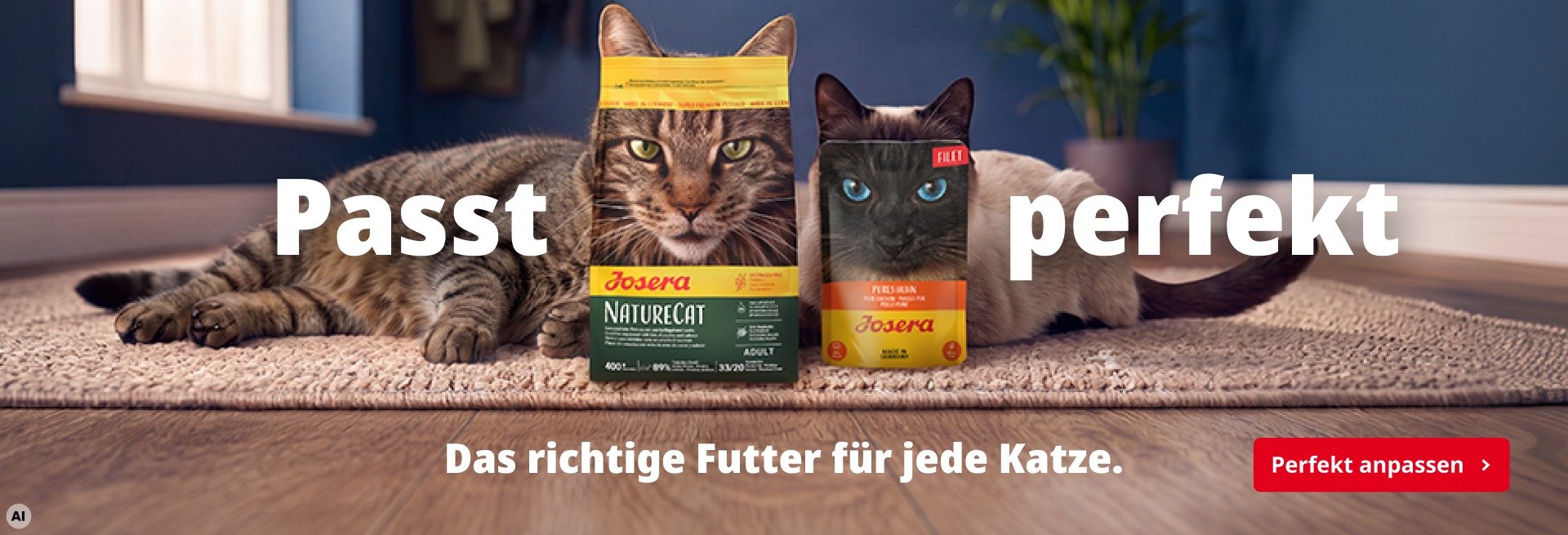 Josera cat food with two cats on a sofa