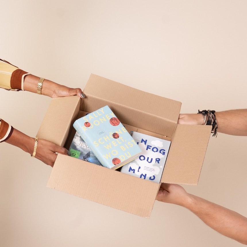 A cardboard box of second-hand books ready to be sent to momox