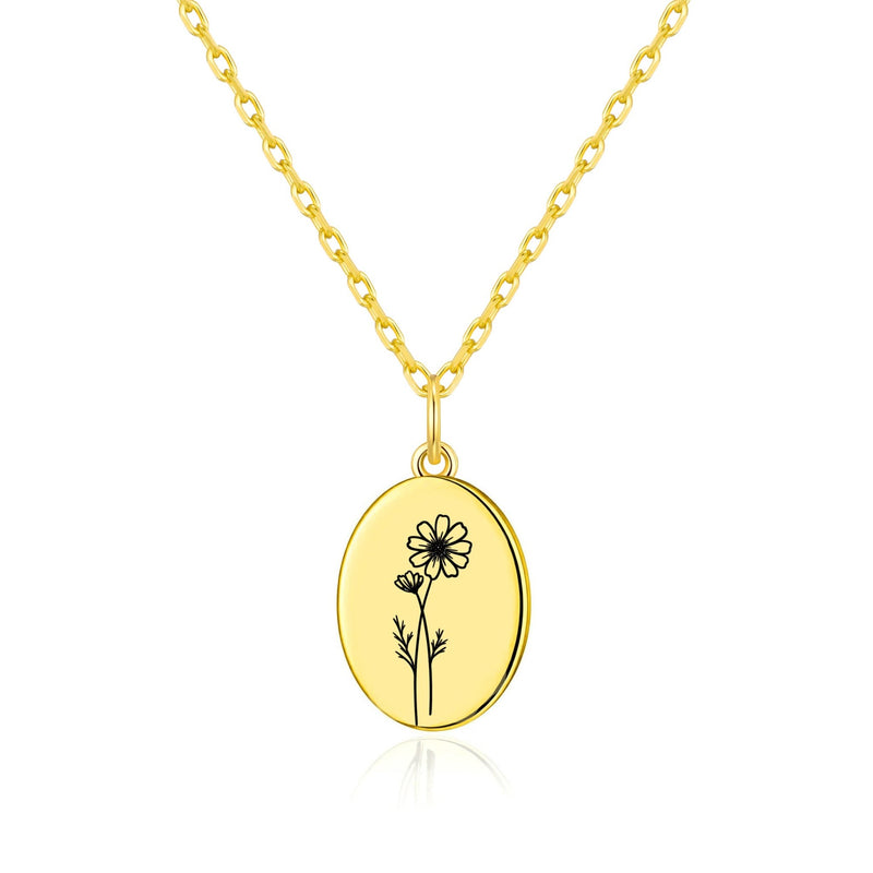 Close-up of the engraved cosmos pendant on the Philip Jones gold plated necklace