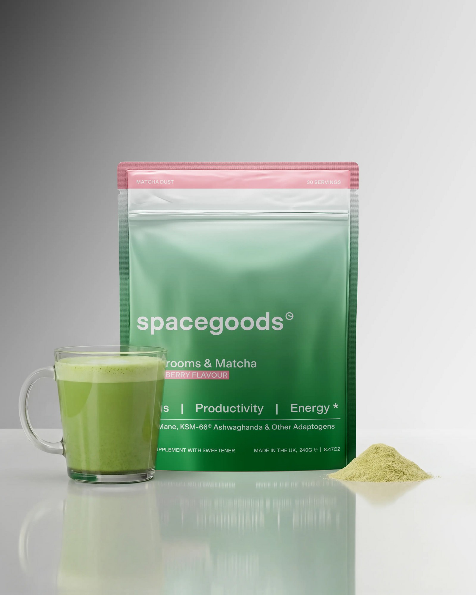 Spacegoods Strawberry Matcha Dust pouch with a green matcha latte
