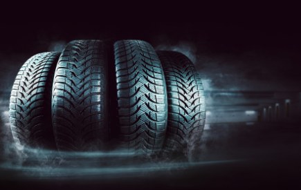 Tyre Tread Depth Explained: 1.6 mm, 3 mm or 4 mm? How to Check and When to Replace Close view of a car tyre tread pattern in dark light
