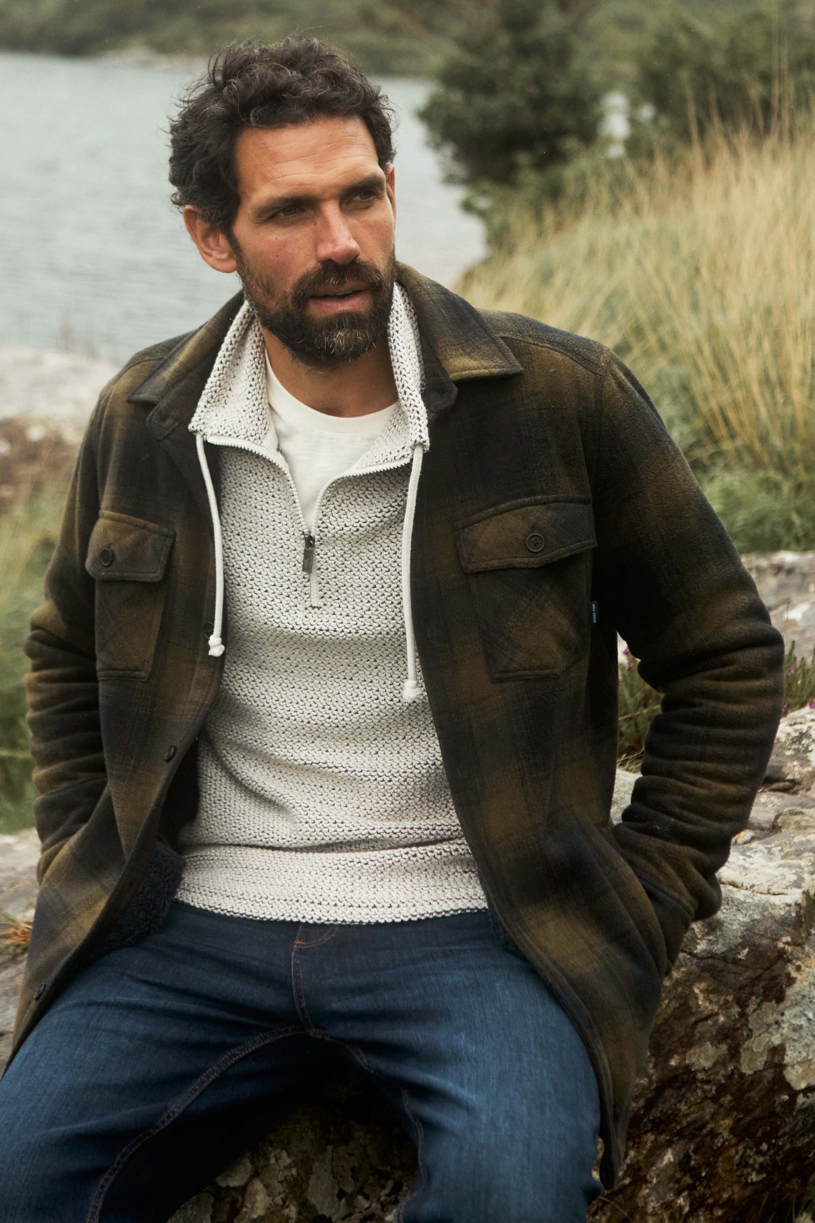 Man wearing the Weird Fish Tyburn check fleece shacket in Olive Moss