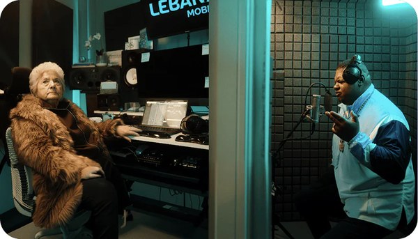 Lebara campaign photo of a presenter in a recording studio
