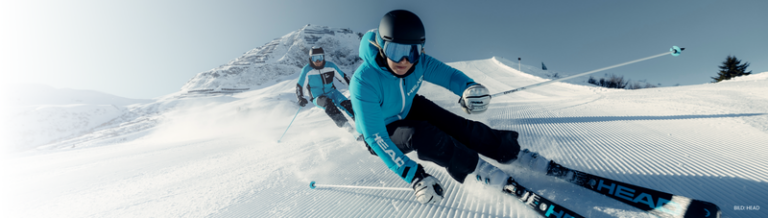 XSPO Ski Shop Guide: How to Get Ski-Ready for the 2026/27 Winter Skier carving on a groomed slope, XSPO alpine ski banner